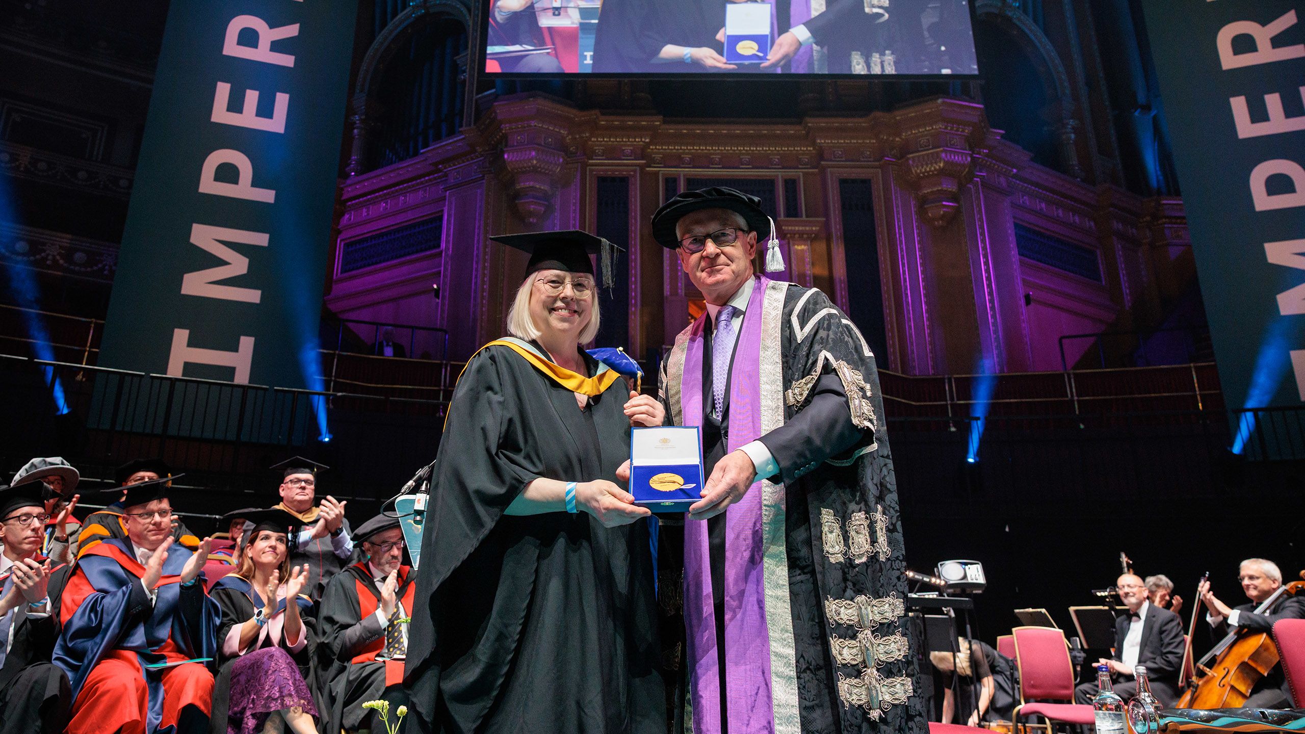 President Hugh Brady and awardee Mrs Afrey Edes
