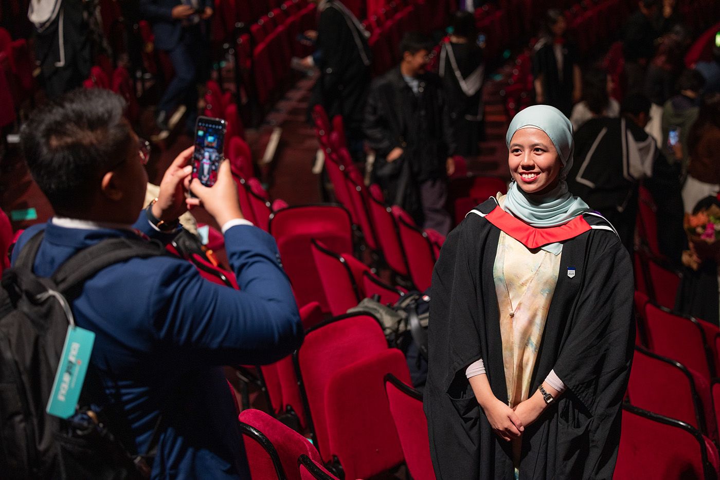 A Faculty of Medicine gradute posing for a photo